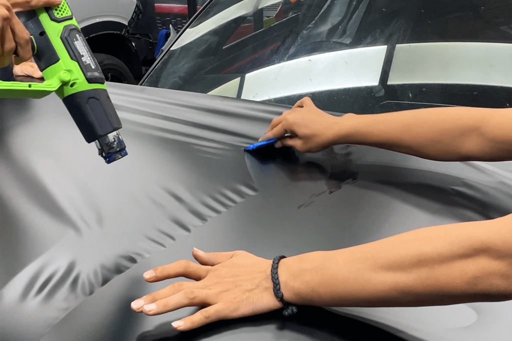 Proses Pemasangan Wrapping Sticker Mobil Jakarta Mustang Satin Black